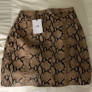 NWT- 100% leather snake print skirt